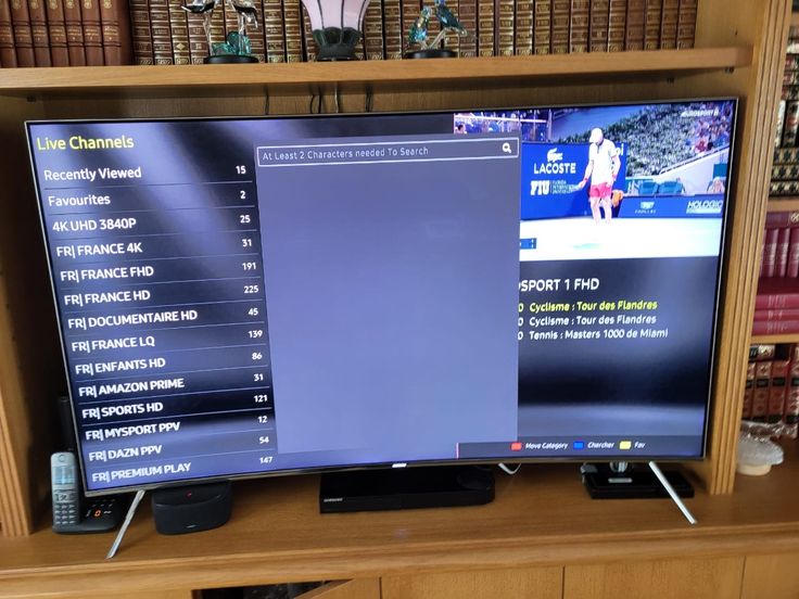 Home television showing an IPTV movie viewing experience